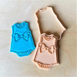 Baby girl dress with bow cookie cutter.