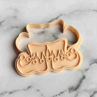 Elf shoes cookie embosser stamp. The icing cutter is perfect for cookies, cupcakes and biscuits.