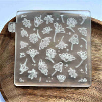 Daisies flowers cookie outbosser stamp made from food safe frosted acrylic.