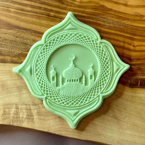 Eid Mubarak decorative fondant outbosser stamp with a mosque inside of a circle.