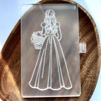 Flower girl outbosser stamp for cakes, cupcakes, biscuits and cookies. The cookie stamp is made from food safe frosted acrylic.