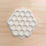 Honeycomb cookie cutter . The embosser stamp is made from food safe PLA, a plant derived bio plastic.