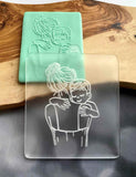 Mother and son outbosser cookie stamp. The fondant cutter is made from food safe frosted acrylic.