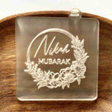 Nikah Mubarak with flowers cookie cutter for weddings.  The popup stamp is made from food safe frosted acrylic.